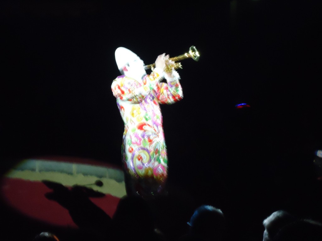 The glamorous clown who opened the show with his trumpet.