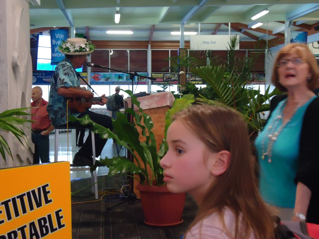 Jake the ukelele player.  He does every international arrival!