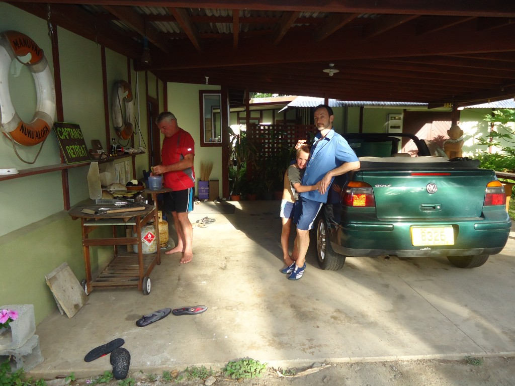 Malcolm cooking with Nick and Andrew lending him moral support.The house is called 'The Captain's Retreat'