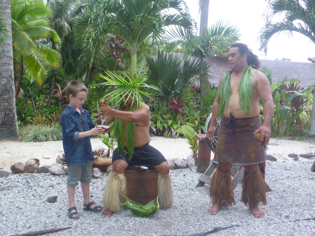 Ben volunteered to hold the coconut shell and to try the milk. He didn't really like it...:-)