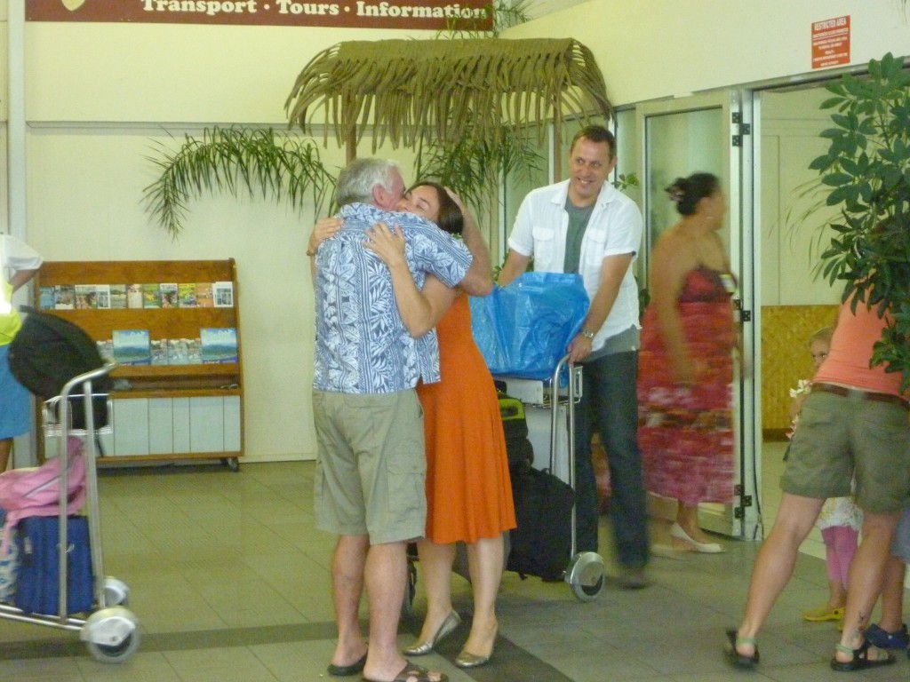 Bonnie and Papa M hugging with Kylie smootching Amelia and Dom.  Lawrence looking on...