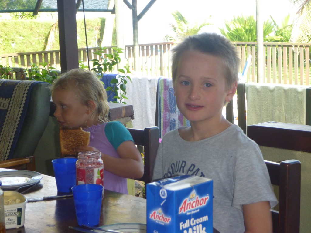 Amelia and Nick enjoying toast and cereal.