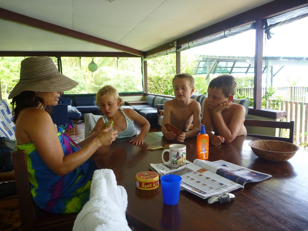 Bonnie playing cards with Amelia, Nick and Dom.