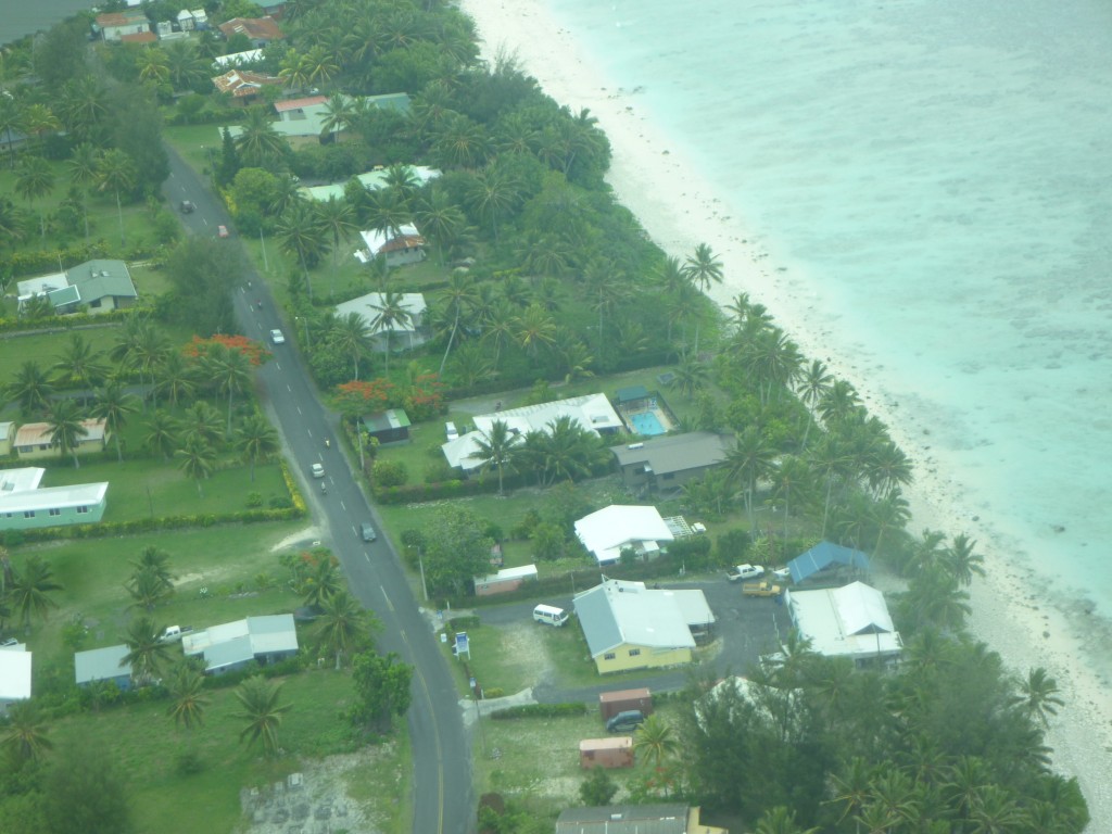 The third house from the bottom of the photo, the one with the blue pool, is our holiday house. The dots in the water is my family! :-)